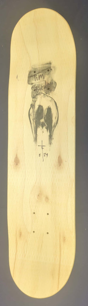 Back of Skate Deck features Tim Burden signature and simplified hollowed face.